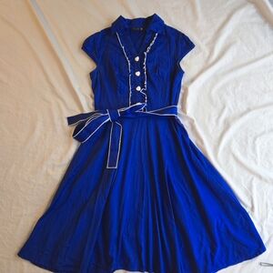 Anni Coco Retro Vintage Style bright blue ruffle trim heart button front